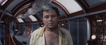 Movie still from “Solaris” (1972), directed by Andrei Tarkovsky – A person wearing a shirt; Close Up shot, Low angle