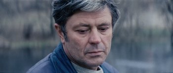 Movie still from “Solaris” (1972), directed by Andrei Tarkovsky – A person wearing a jacket; Close Up shot, High angle