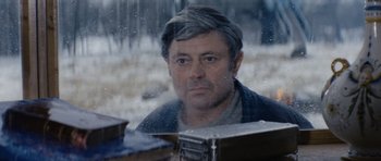 Movie still from “Solaris” (1972), directed by Andrei Tarkovsky – A person looking out a window; Close Up shot, High angle