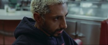 Movie still from “Sound of Metal” (2019), directed by Darius Marder – A person with white hair; Close Up shot, High angle