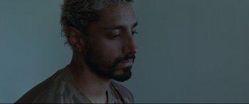 Movie still from “Sound of Metal” (2019), directed by Darius Marder – A person with his eyes closed; Close Up shot, High angle