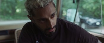 Movie still from “Sound of Metal” (2019), directed by Darius Marder – A person with white hair; Close Up shot, High angle