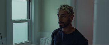 Movie still from “Sound of Metal” (2019), directed by Darius Marder – A person wearing a black shirt; Close Up shot, Low angle