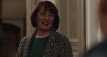 Movie still from “Spotlight” (2015), directed by Tom McCarthy – A person wearing a green shirt; Close Up shot, Over the shoulder angle