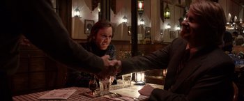 Movie still from “Steve Jobs” (2015), directed by Danny Boyle – Medium shot, Over the shoulder angle