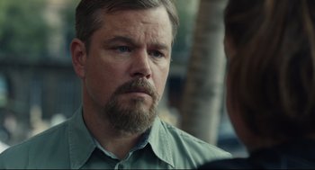 Movie still from “Stillwater” (2021), directed by Tom McCarthy – A person with a beard; Close Up shot, Over the shoulder angle