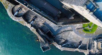 Movie still from “Belfast” (2021), directed by Kenneth Branagh – An aerial view of a body of water; Extreme Wide shot, Overhead angle