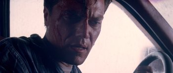 Movie still from “Take Shelter” (2011), directed by Jeff Nichols – A man's face with blood on his face; Close Up shot, Low angle