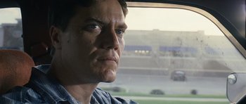Movie still from “Take Shelter” (2011), directed by Jeff Nichols – A person looking out a car window; Close Up shot, Over the shoulder angle