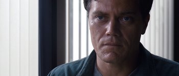Movie still from “Take Shelter” (2011), directed by Jeff Nichols – A person with blue eyes; Close Up shot, Low angle