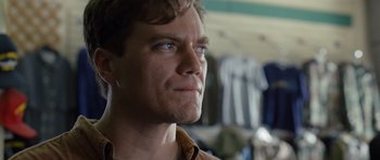 Movie still from “Take Shelter” (2011), directed by Jeff Nichols – A person looking up at something; Close Up shot, Low angle