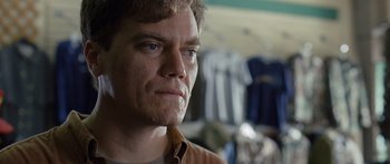 Movie still from “Take Shelter” (2011), directed by Jeff Nichols – A person looking at the camera; Close Up shot, Low angle