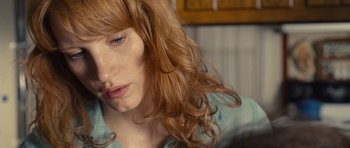 Movie still from “Take Shelter” (2011), directed by Jeff Nichols – A person with long hair; Close Up shot, Over the shoulder angle