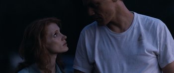 Movie still from “Take Shelter” (2011), directed by Jeff Nichols – A man and a woman looking at one another; Close Up shot, Low angle