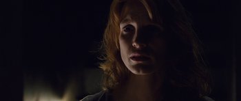 Movie still from “Take Shelter” (2011), directed by Jeff Nichols – A person with long red hair; Close Up shot, Low angle
