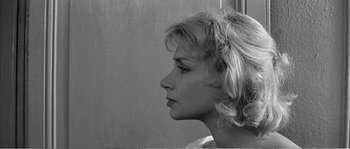 Movie still from “The 400 Blows” (1959), directed by François Truffaut – A black - and - white photo of a woman's face; Close Up shot, Over the shoulder angle