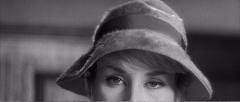 Movie still from “The 400 Blows” (1959), directed by François Truffaut – A person wearing a hat; Extreme Close Up shot, Overhead angle