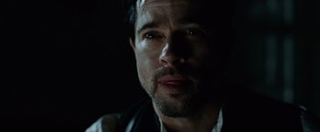 Movie still from “The Assassination of Jesse James by the Coward Robert Ford” (2007), directed by Andrew Dominik – A person looking at the camera; Close Up shot, Low angle