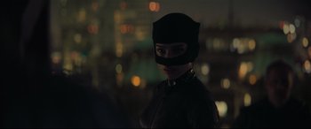 Movie still from “The Batman” (2022), directed by Matt Reeves – A woman wearing a cat suit and a cat mask; Close Up shot, Over the shoulder angle