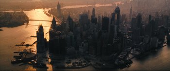 Movie still from “The Batman” (2022), directed by Matt Reeves – An aerial view of a large city at sunset; Extreme Wide shot, High angle