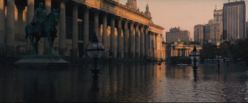 Movie still from “The Batman” (2022), directed by Matt Reeves – A building that has a lot of pillars in it; Extreme Wide shot, High angle