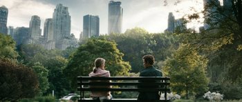 Movie still from “The Boys” (2019), created by Eric Kripke – A man and a woman sitting on a park bench; Wide shot, Low angle