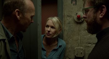 Movie still from “Birdman or (The Unexpected Virtue of Ignorance)” (2014), directed by Alejandro G. Iñárritu – A man and a woman standing next to each other in a room; Close Up shot, Over the shoulder angle