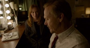 Movie still from “Birdman or (The Unexpected Virtue of Ignorance)” (2014), directed by Alejandro G. Iñárritu – A man and a woman sitting at a table; Medium shot, Over the shoulder angle