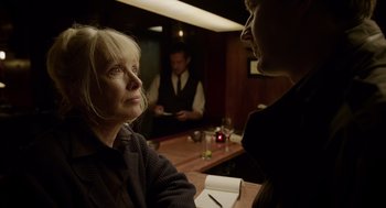 Movie still from “Birdman or (The Unexpected Virtue of Ignorance)” (2014), directed by Alejandro G. Iñárritu – A woman sitting at a table talking to another woman; Close Up shot, Over the shoulder angle