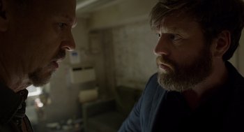 Movie still from “Birdman or (The Unexpected Virtue of Ignorance)” (2014), directed by Alejandro G. Iñárritu – Two men are facing each other in a room; Close Up shot, Over the shoulder angle