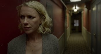 Movie still from “Birdman or (The Unexpected Virtue of Ignorance)” (2014), directed by Alejandro G. Iñárritu – A woman standing in the hallway of a building; Close Up shot, Low angle