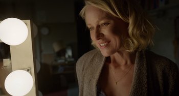 Movie still from “Birdman or (The Unexpected Virtue of Ignorance)” (2014), directed by Alejandro G. Iñárritu – A person wearing a jacket; Close Up shot, Over the shoulder angle