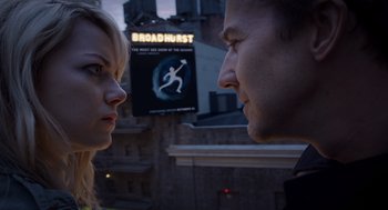 Movie still from “Birdman or (The Unexpected Virtue of Ignorance)” (2014), directed by Alejandro G. Iñárritu – A man and a woman face to face in front of a broadway sign; Close Up shot, Over the shoulder angle