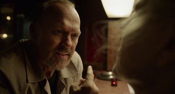 Movie still from “Birdman or (The Unexpected Virtue of Ignorance)” (2014), directed by Alejandro G. Iñárritu – An older man talking to a woman in a restaurant; Close Up shot, Over the shoulder angle