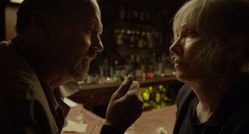 Movie still from “Birdman or (The Unexpected Virtue of Ignorance)” (2014), directed by Alejandro G. Iñárritu – A man and a woman talking in front of a bar; Close Up shot, Over the shoulder angle