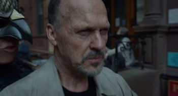Movie still from “Birdman or (The Unexpected Virtue of Ignorance)” (2014), directed by Alejandro G. Iñárritu – An older man with a beard and a mustache; Close Up shot, Low angle