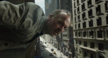 Movie still from “Birdman or (The Unexpected Virtue of Ignorance)” (2014), directed by Alejandro G. Iñárritu – A person looking out of a window; Close Up shot, Low angle
