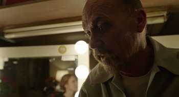 Movie still from “Birdman or (The Unexpected Virtue of Ignorance)” (2014), directed by Alejandro G. Iñárritu – A person with a beard; Close Up shot, Low angle