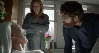 Movie still from “Birdman or (The Unexpected Virtue of Ignorance)” (2014), directed by Alejandro G. Iñárritu – A man and a woman in a room with a baby; Medium shot, Over the shoulder angle