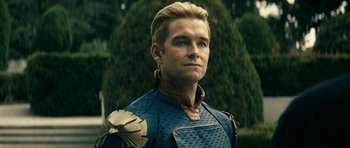 Movie still from “The Boys” (2019), created by Eric Kripke – A person wearing a costume; Close Up shot, Over the shoulder angle