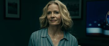 Movie still from “The Boys” (2019), created by Eric Kripke – A person with blonde hair wearing a blue shirt; Close Up shot, Low angle