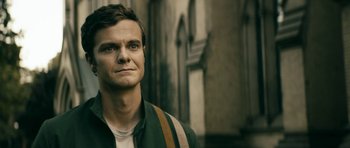 Movie still from “The Boys” (2019), created by Eric Kripke – A person wearing a green shirt; Close Up shot, Over the shoulder angle