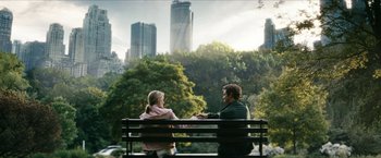 Movie still from “The Boys” (2019), created by Eric Kripke – A man and a woman sitting on a park bench; Wide shot, High angle