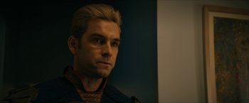 Movie still from “The Boys” (2019), created by Eric Kripke – A person wearing a jacket; Close Up shot, Over the shoulder angle