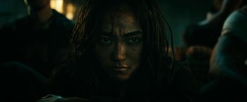 Movie still from “The Boys” (2019), created by Eric Kripke – A person with long black hair; Close Up shot, High angle