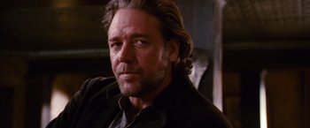 Movie still from “3:10 to Yuma” (2007), directed by James Mangold – A person with long hair; Close Up shot, Over the shoulder angle