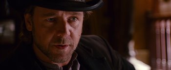 Movie still from “3:10 to Yuma” (2007), directed by James Mangold – A person wearing a hat; Close Up shot, Over the shoulder angle