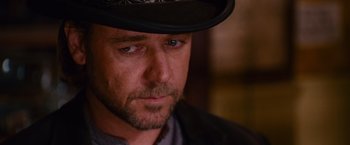 Movie still from “3:10 to Yuma” (2007), directed by James Mangold – A person wearing a hat; Close Up shot, Low angle