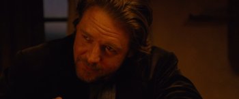 Movie still from “3:10 to Yuma” (2007), directed by James Mangold – A person with long hair; Close Up shot, Over the shoulder angle