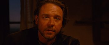 Movie still from “3:10 to Yuma” (2007), directed by James Mangold – A person with a beard; Close Up shot, Over the shoulder angle